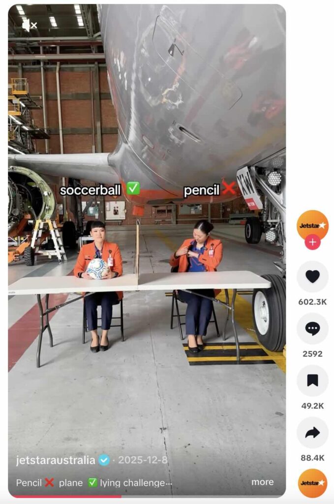 A TikTok post from Jetstar Australia showcasing the "lying game" trend, with one of the participants attempting to conceal a jet.