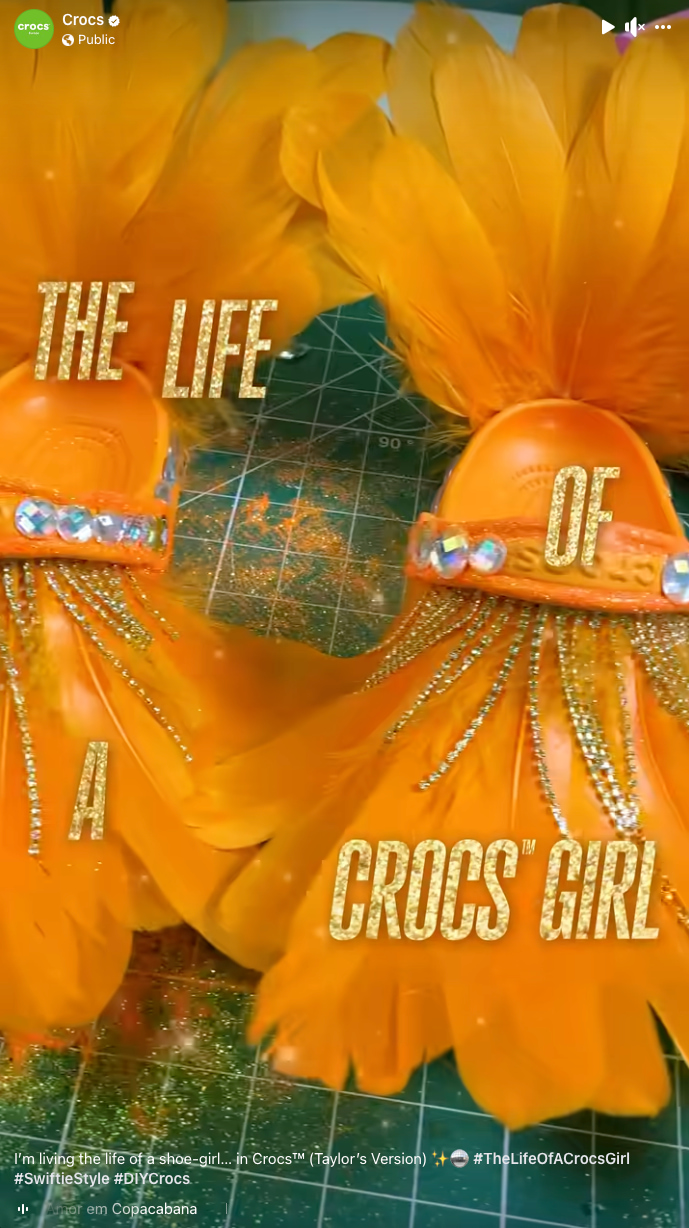 A Facebook video showing orange Crocs with feather decorations and gems