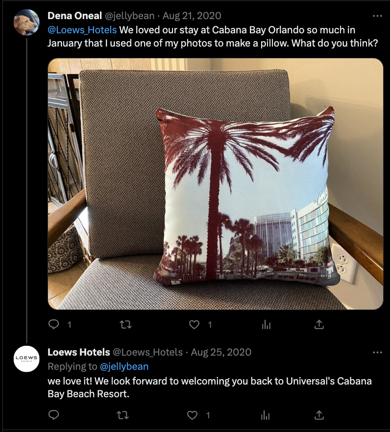 A screenshot of a Tweet sent to Loews Hotels by a happy customer who made a pillow of one of their vacation photos. Loews Hotel responded that they loved the pillow, and look forward to welcoming them back to the resort. 